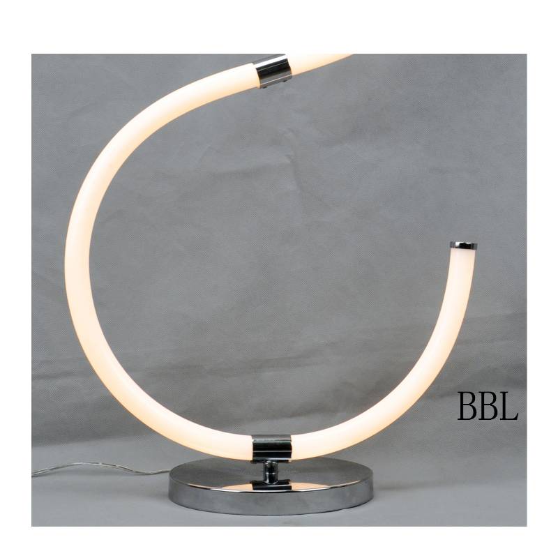 Lampada da tavolo a LED con tubo acrilico a forma di S.