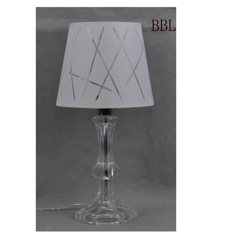 Lampada da tavolo con ombreggiatura in tessuto e corpo trasparente di lampada acrilica